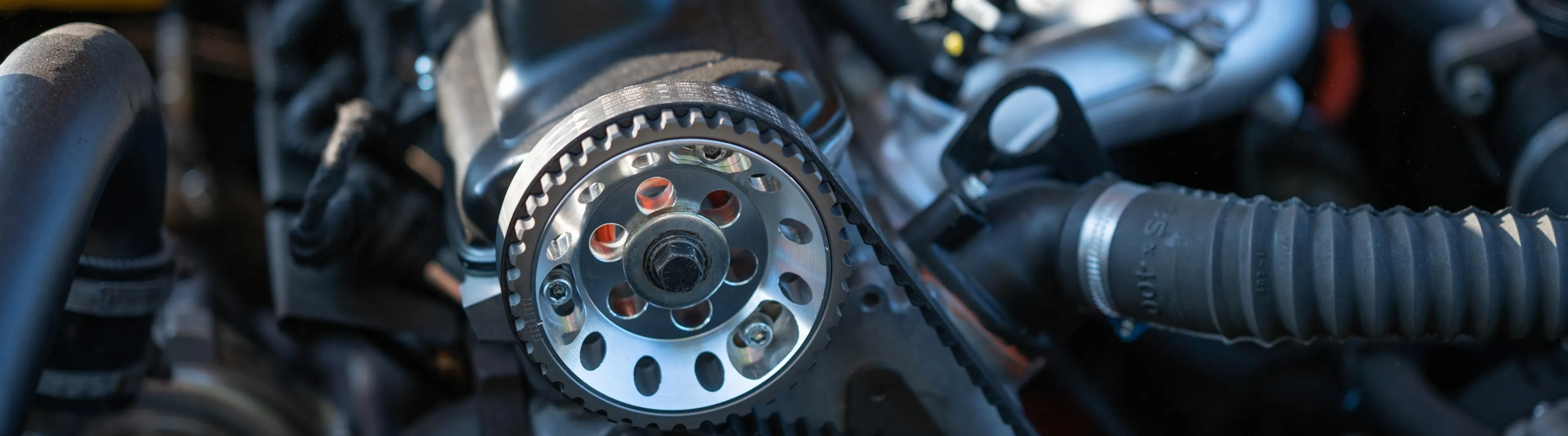 a mechanic is removing timing belt
