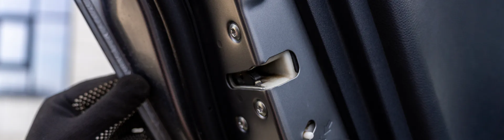 a-mechanic-checks-a-door-lock-actuator