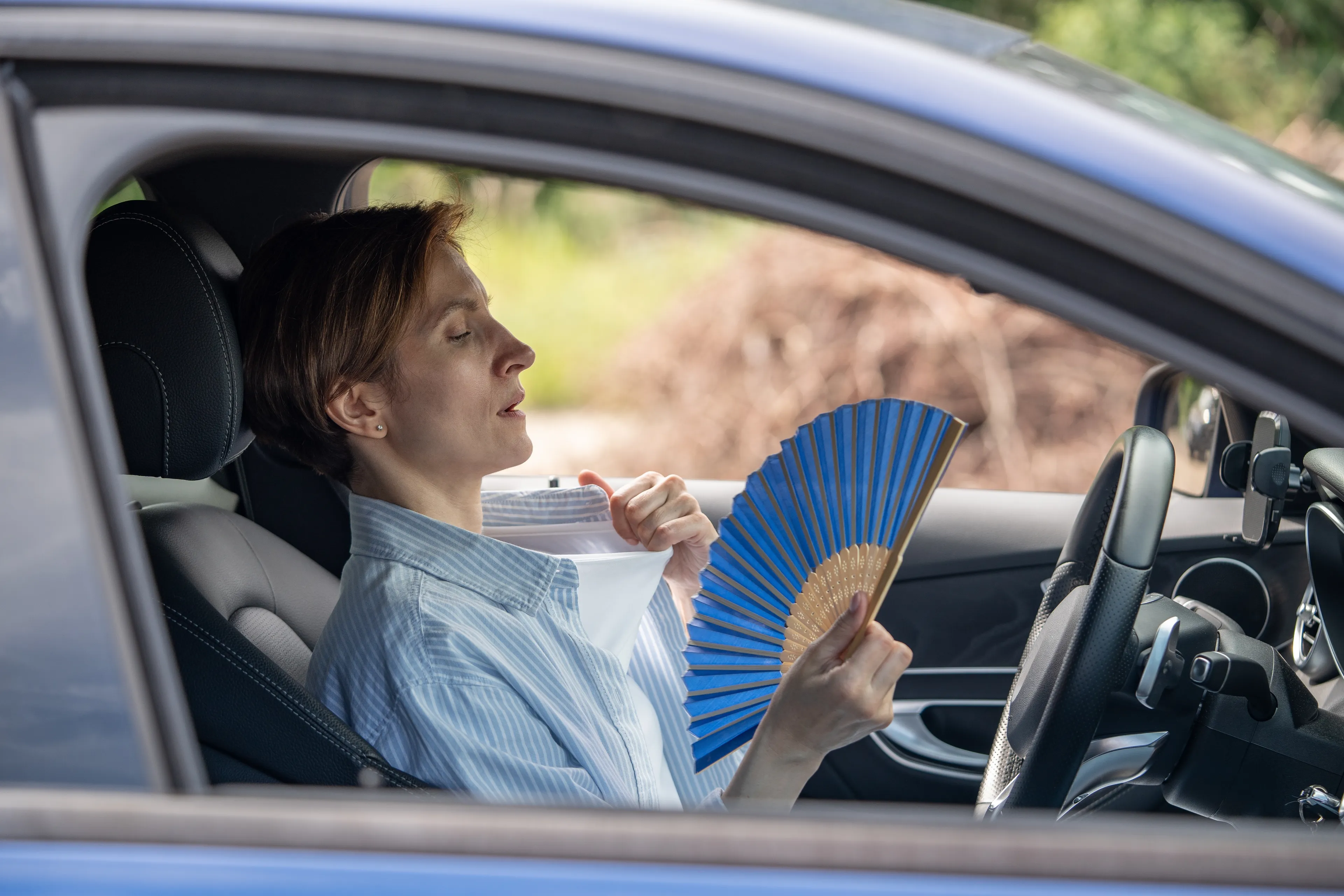 Why Is My Car AC Blowing Hot Air? 5 Common Causes