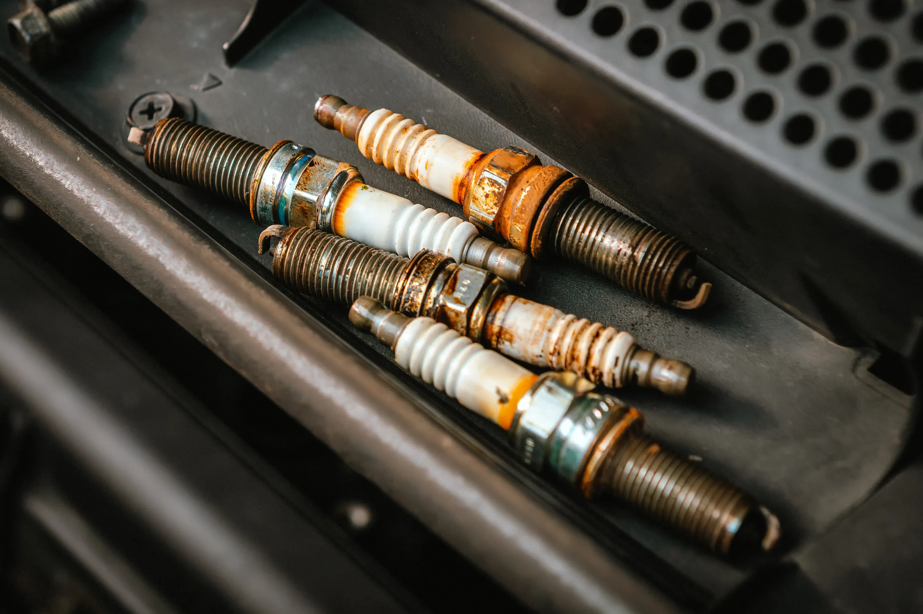 Oil on Spark Plug Threads: What It Means and What to Do
